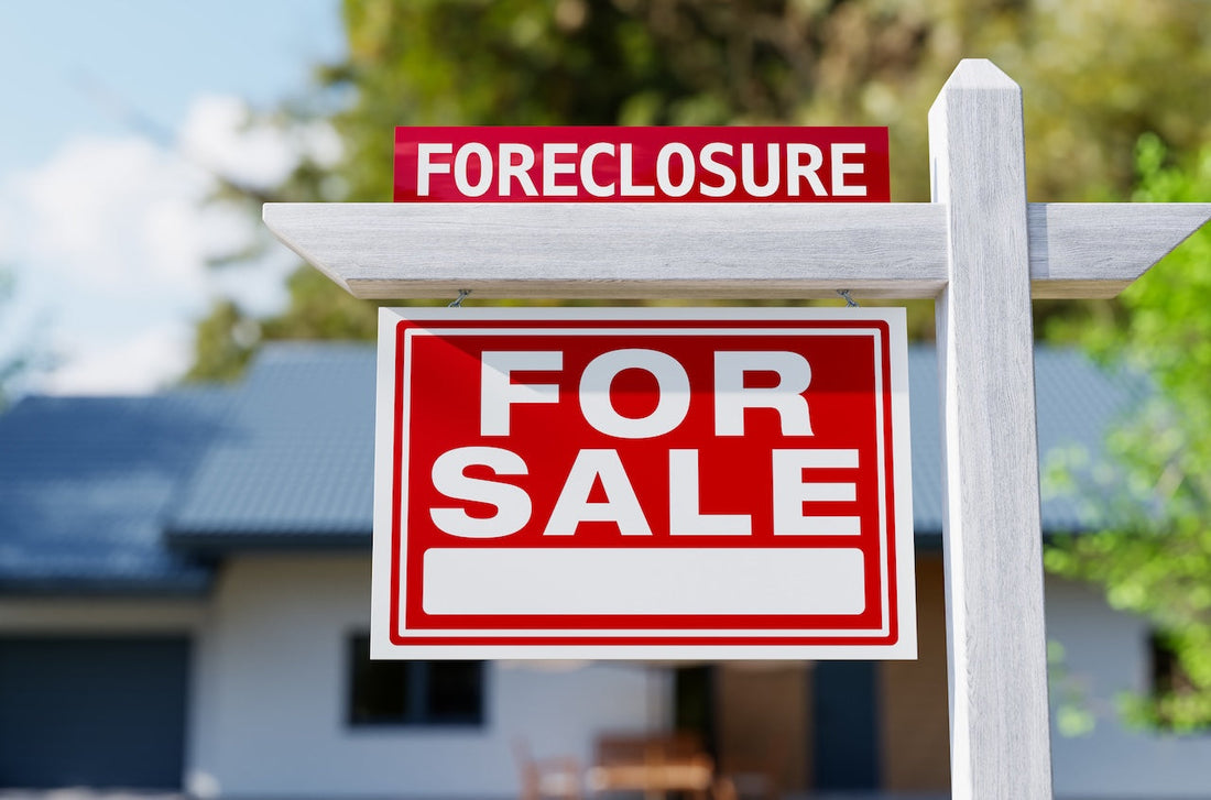 real estate investor reviewing distressed property deal